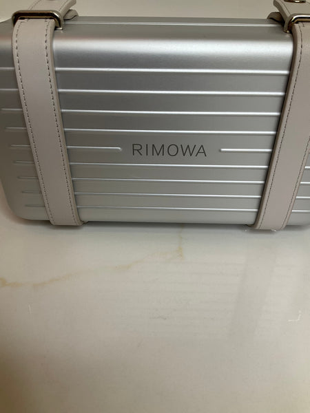 Dior rimowa personal clutch