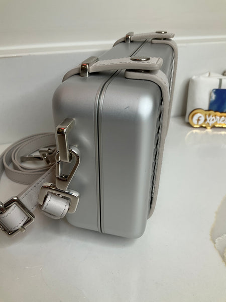 Dior rimowa personal clutch