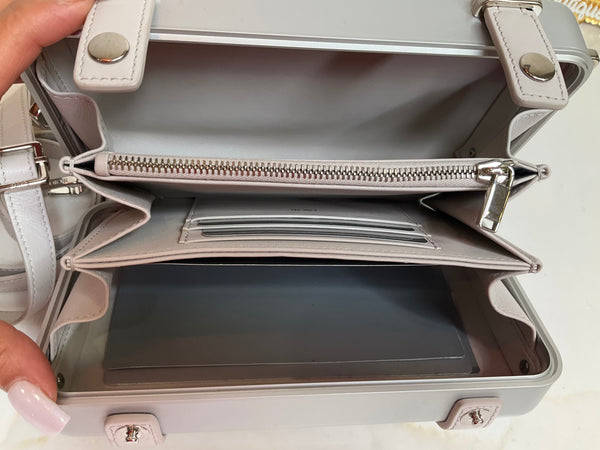 Dior rimowa personal clutch