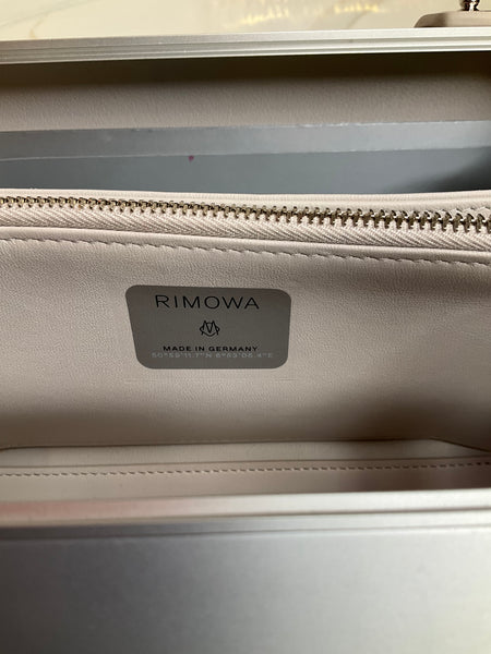 Dior rimowa personal clutch