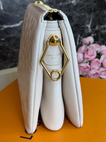 Louis Vuitton Cousin crema