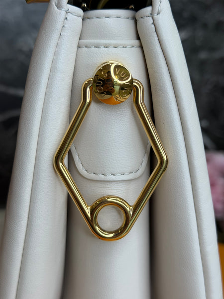 Louis Vuitton Cousin crema