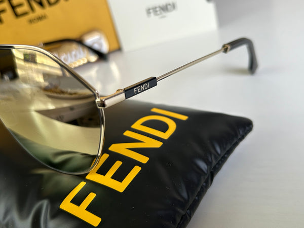 Fendi lente de sol dorado