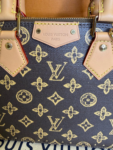 Louis Vuitton Alma bb trunk monograma