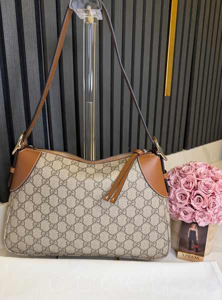 Gucci emblem shoulder bag