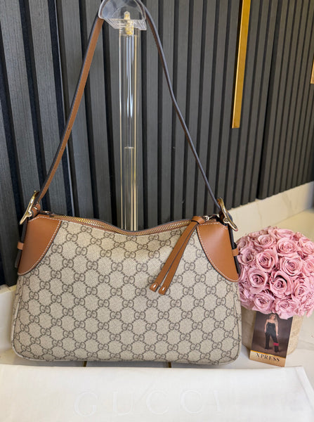Gucci emblem shoulder bag