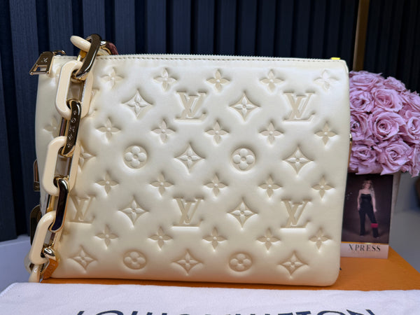 Louis Vuitton Cousin amarilla