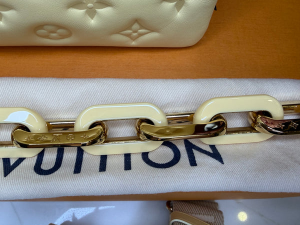 Louis Vuitton Cousin amarilla