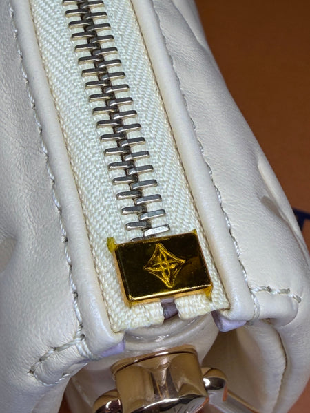 Louis Vuitton Cousin amarilla
