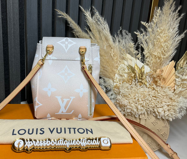 Louis Vuitton tiny backpack by the pool