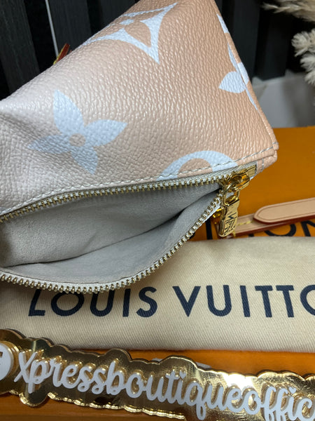Louis Vuitton tiny backpack by the pool