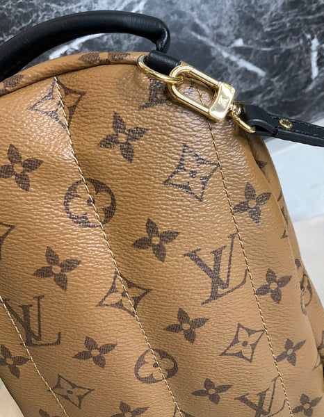 Louis Vuitton reverse Palm Spring mini backpack