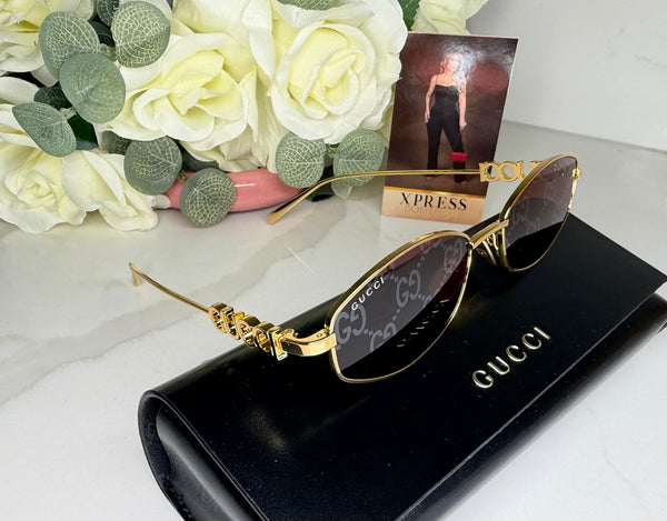 Gucci lentes de sol logo GG1802S 002