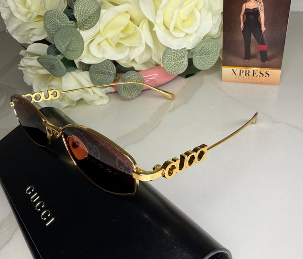Gucci lentes de sol logo GG1802S 002